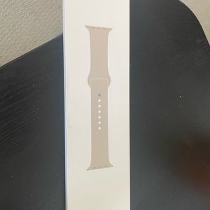 New in box starlight Apple Watch band